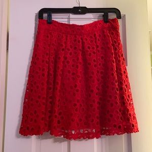GB red skirt with floral overlay
